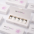 Mesoten H hyaluronic acid ampoules with white product boxes in a clean studio display