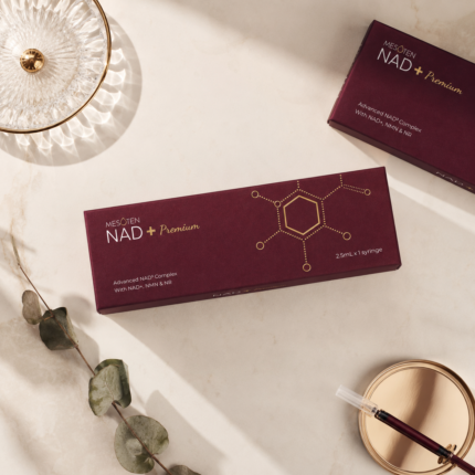 Mesoten NAD+ Premium box displayed on a burgundy pedestal for a luxury product gallery