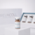 Revacoll Advanced Collagen Powder vial on white pedestal with packaging background