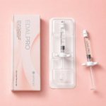 Close-up of Edal Pro pre-filled syringe beside pink Akradex packaging