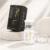 ElastiFill vial and black AKRADEX box displayed on a luxury light stone product setup