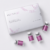 Flat lay of Mesoten Pure Skin box with multiple 3ml vials