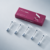 Mesoten Combo DNA i syringe and magenta product box on a soft pink product photography background