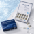 Atlantis Hair PDRN and exosome scalp booster kit beside a blue water background